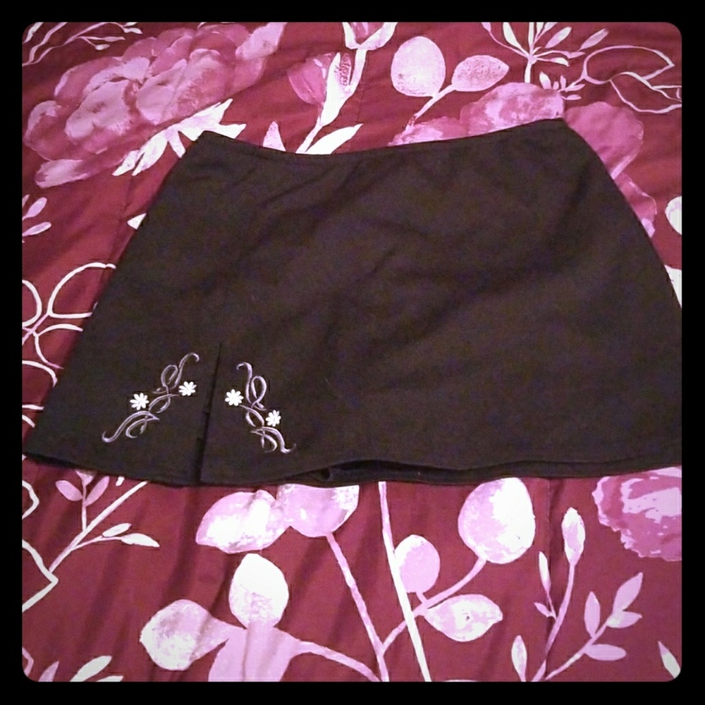 Black mini skirt with floral designs